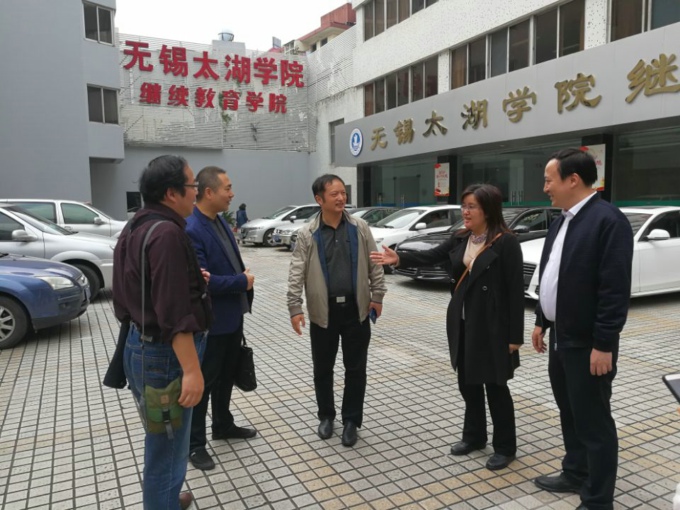 省高等教育自学考试教材采购与发行服务调研座谈会在我院召开2.jpg
